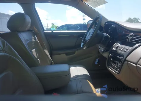 2002 Cadillac Deville Standard из США, поврежденный, VIN 1G6KD54Y62U110981